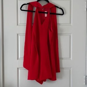 Red v neck romper that ties in the back